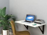Wall mounted folding table